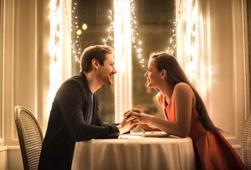 A christian couple on a date in a restaurant