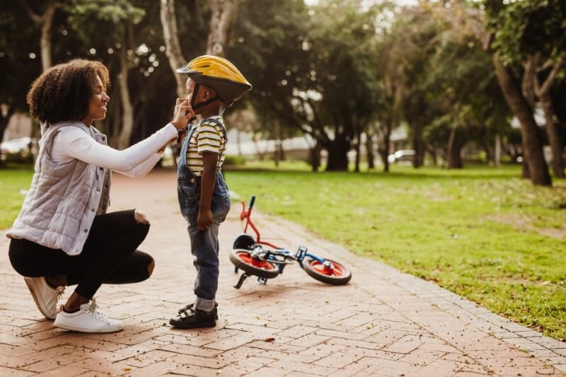 single mum takes teaches her son how to ride a bike