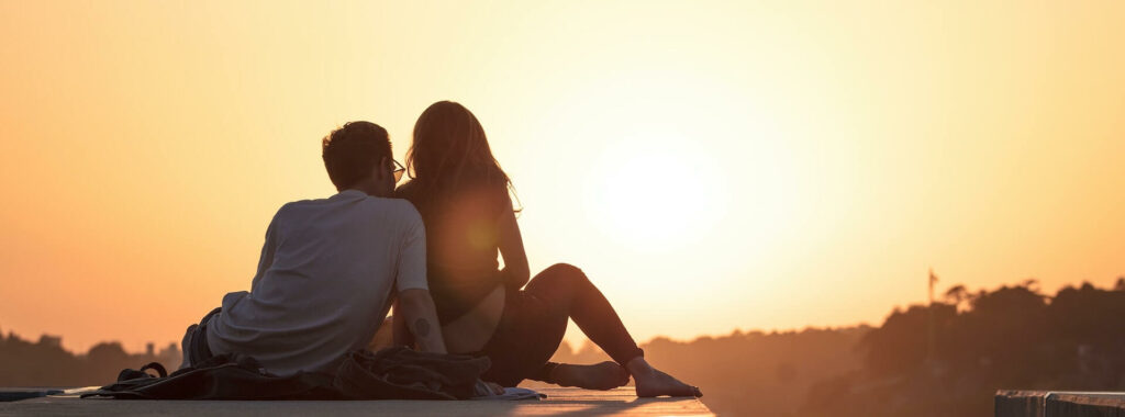couple looking at sunset believes you need to turn your situationship into a relationship